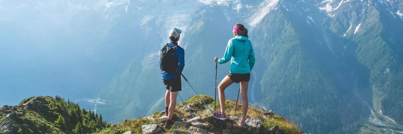 Two hikers looking out over Mont Blanc in Chamonix in the French Alps